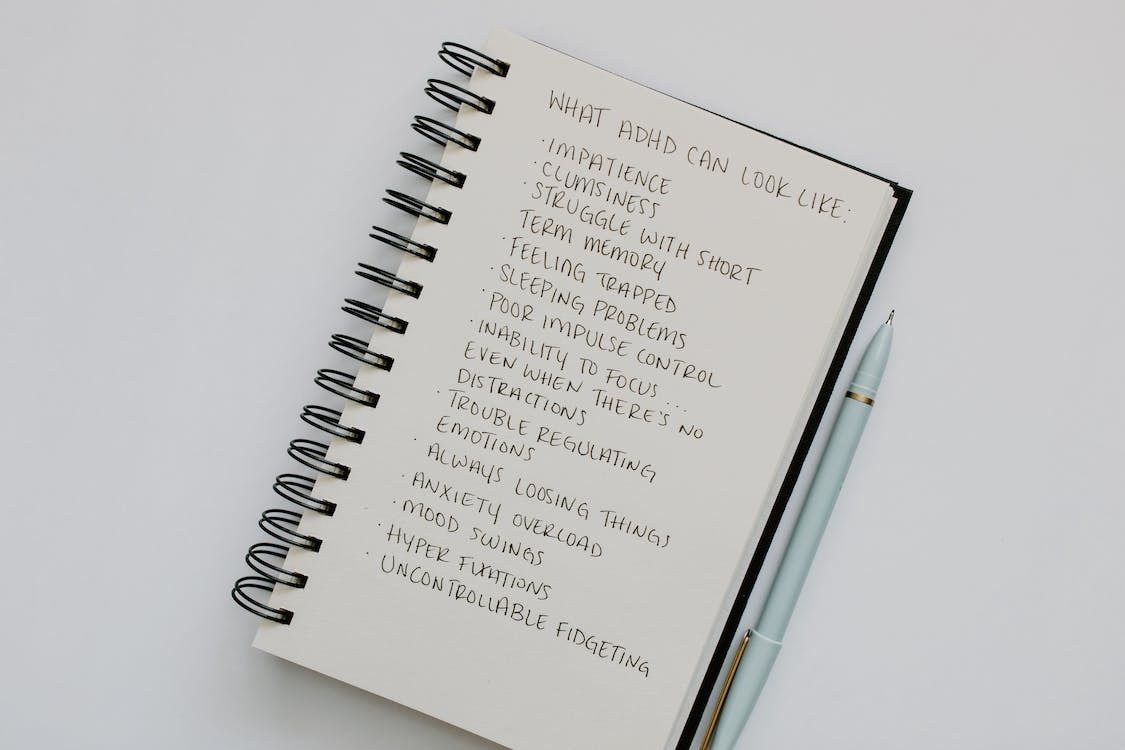 Notebook with a list of ADHD related behaviors